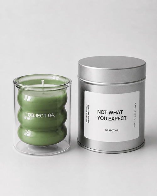 Mint & basil scented candle: green glass jar plus silver tin labeled "NOT WHAT YOU EXPECT".